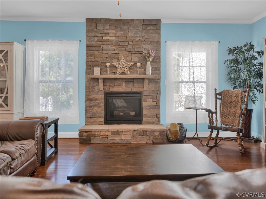 2842 Bayfront Way Midlothian, VA 23112 - Photo 10 of 50 a living room with furniture and a fireplace