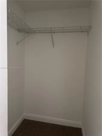 a view of small space with racks on the wall