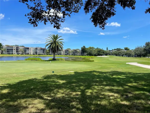 a view of a large building with a big yard