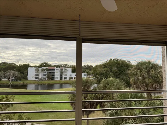 a view of a balcony with a ocean view