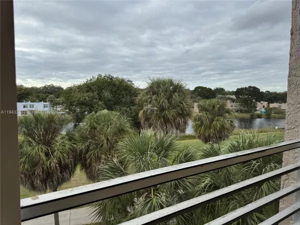 a view of a lake from a balcony