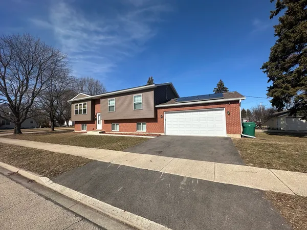 front view of a house with a street