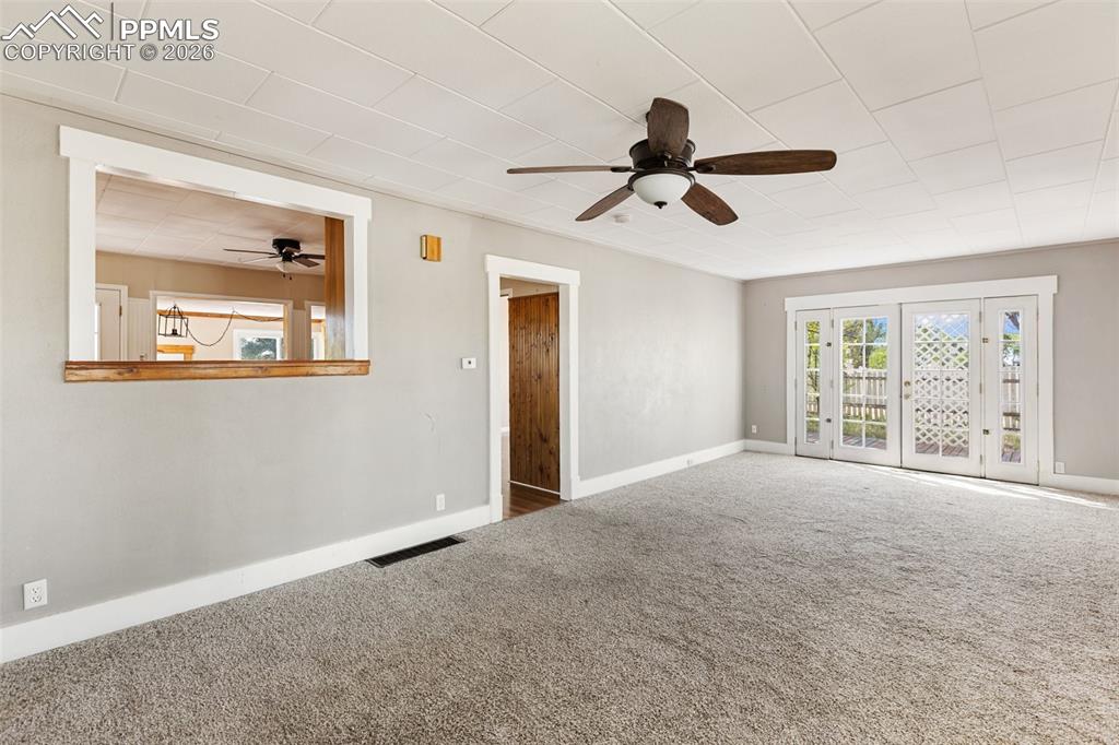 10355 Link Road Fountain, CO 80817 - Photo 21 of 45 a view of an empty room with a window