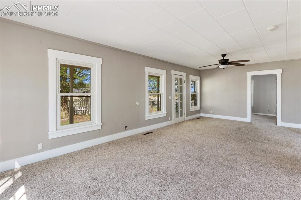 10355 Link Road Fountain, CO 80817 - Photo 22 of 45 a view of an empty room with a window