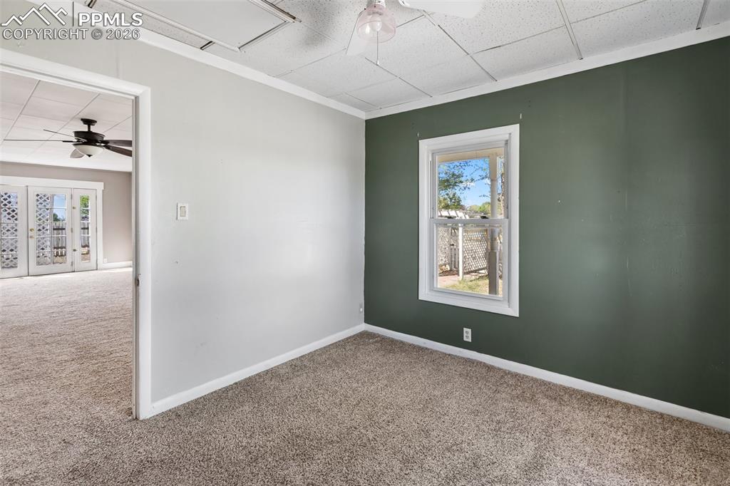 10355 Link Road Fountain, CO 80817 - Photo 23 of 45 an empty room with windows and closet
