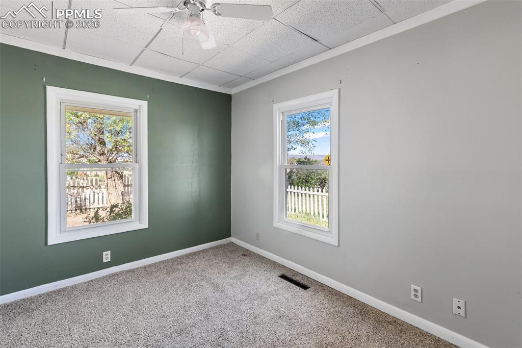 10355 Link Road Fountain, CO 80817 - Photo 25 of 45 an empty room with windows and closet