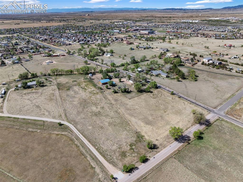 10355 Link Road Fountain, CO 80817 - Photo 45 of 45 an aerial view of a house with a yard and ocean view