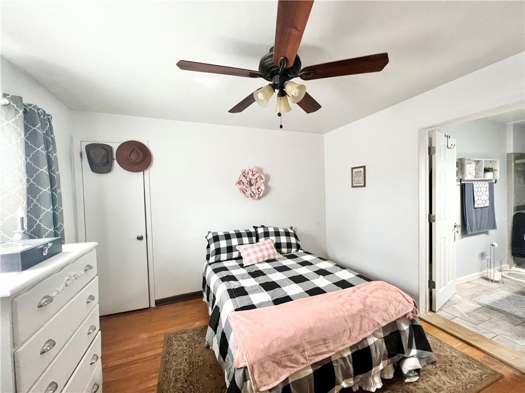 1480 Harvey Run Road Freedom, PA 15042 - Photo 20 of 26 a bedroom with a bed and a dresser