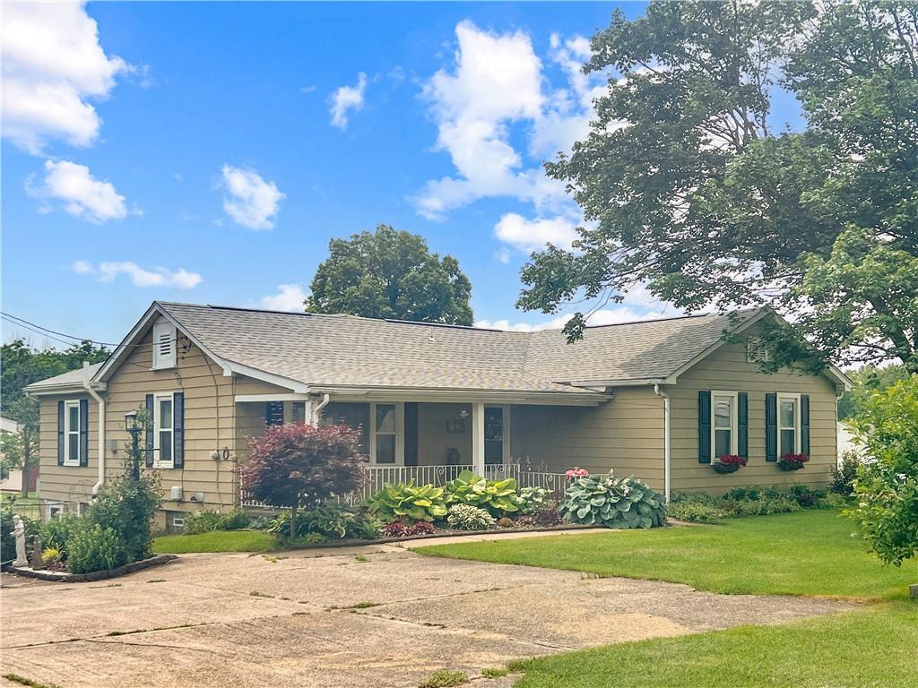 1480 Harvey Run Road Freedom, PA 15042 - Photo 2 of 26 a front view of a house with a yard