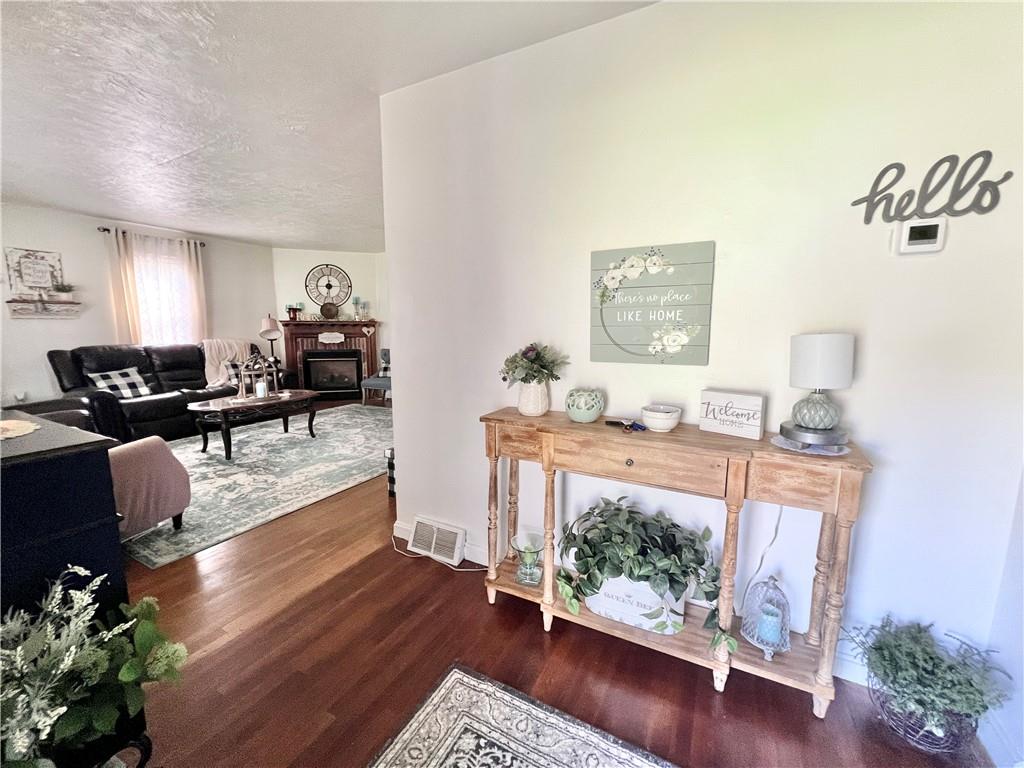 1480 Harvey Run Road Freedom, PA 15042 - Photo 9 of 26 a living room with furniture and wooden floor