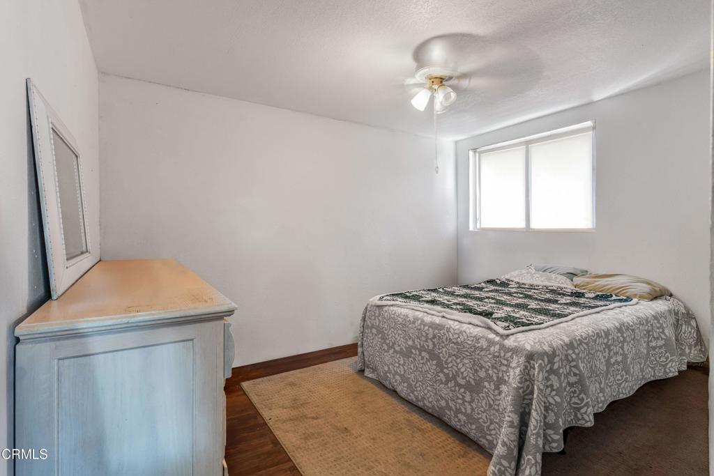 3290 Cole Avenue Simi Valley, CA 93063 - Photo 14 of 24 a bedroom with a bed and a window