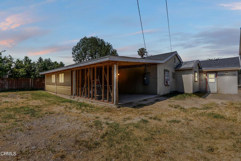 3290 Cole Avenue Simi Valley, CA 93063 - Photo 18 of 24 a view of a house with a backyard