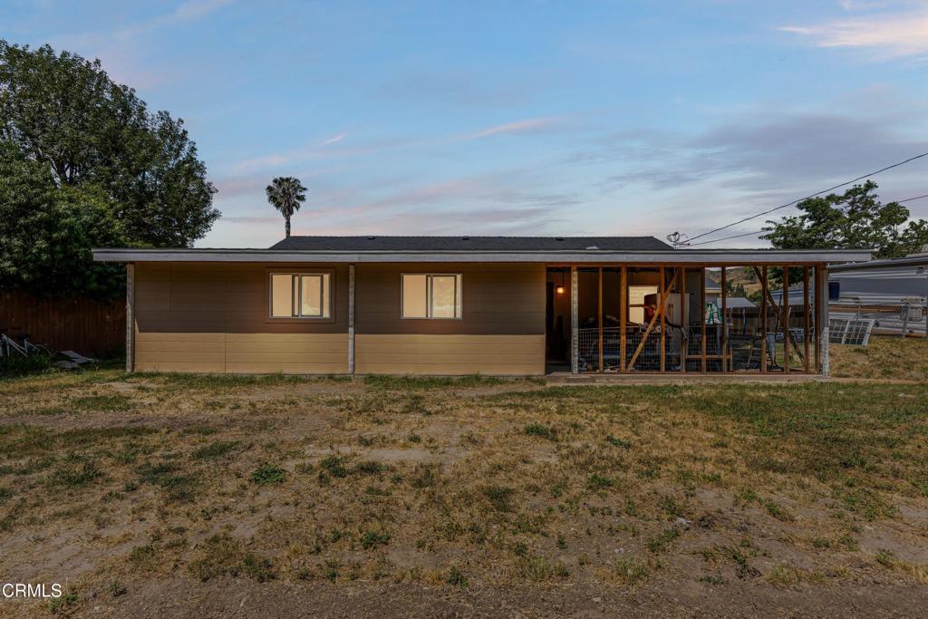 3290 Cole Avenue Simi Valley, CA 93063 - Photo 20 of 24 a front view of a house with garden