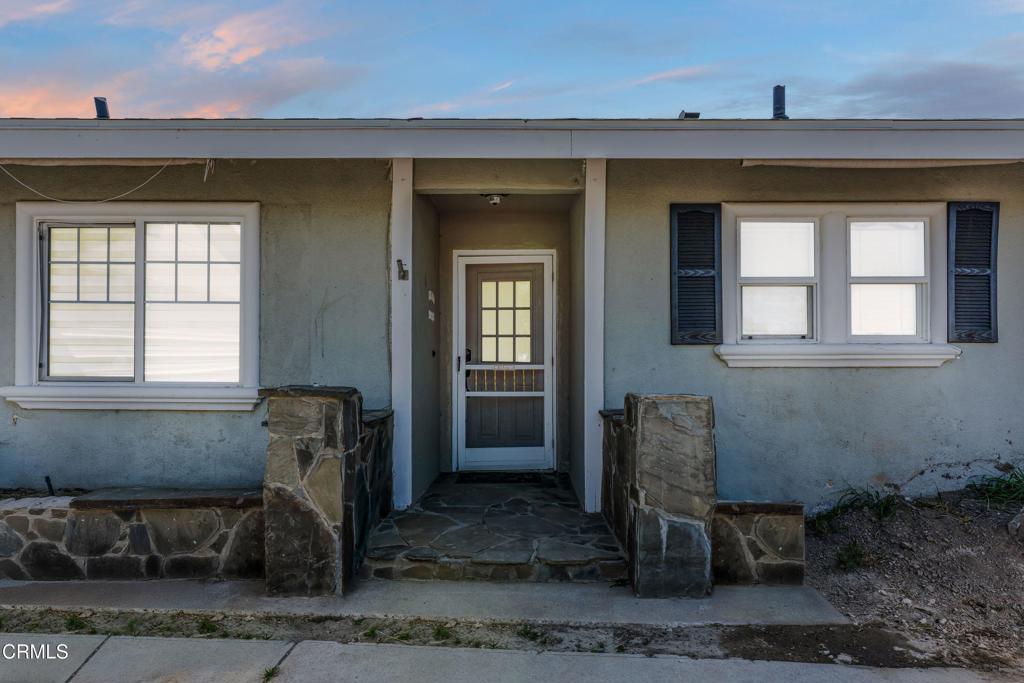 3290 Cole Avenue Simi Valley, CA 93063 - Photo 2 of 24 a front view of a house with glass windows