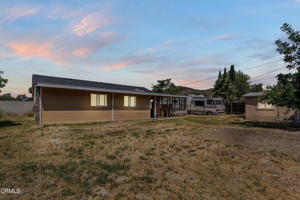 3290 Cole Avenue Simi Valley, CA 93063 - Photo 21 of 24 a front view of a house with a yard