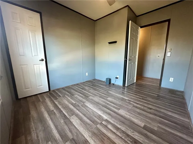 a view of a livingroom with wooden floor