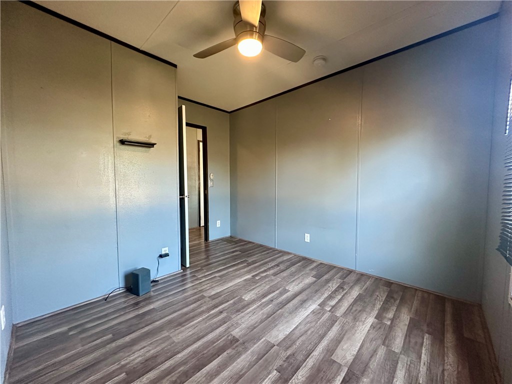 1708 Hill Street Sandia, TX 78383 - Photo 16 of 16 a view of a livingroom with wooden floor