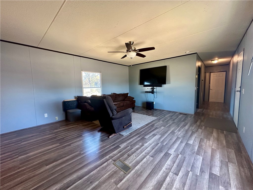 1708 Hill Street Sandia, TX 78383 - Photo 3 of 16 a living room with furniture and a flat screen tv