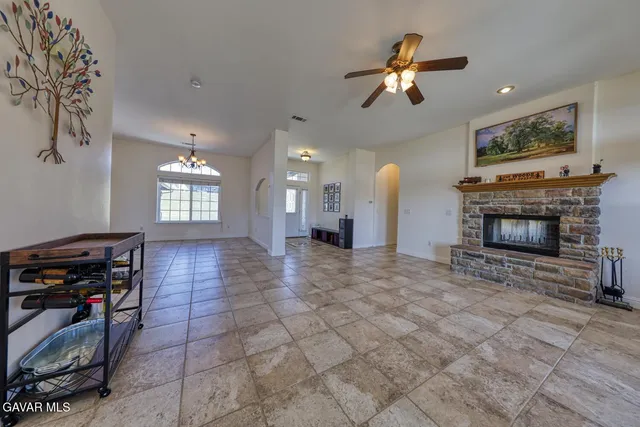 a view of livingroom with furniture and chandelier