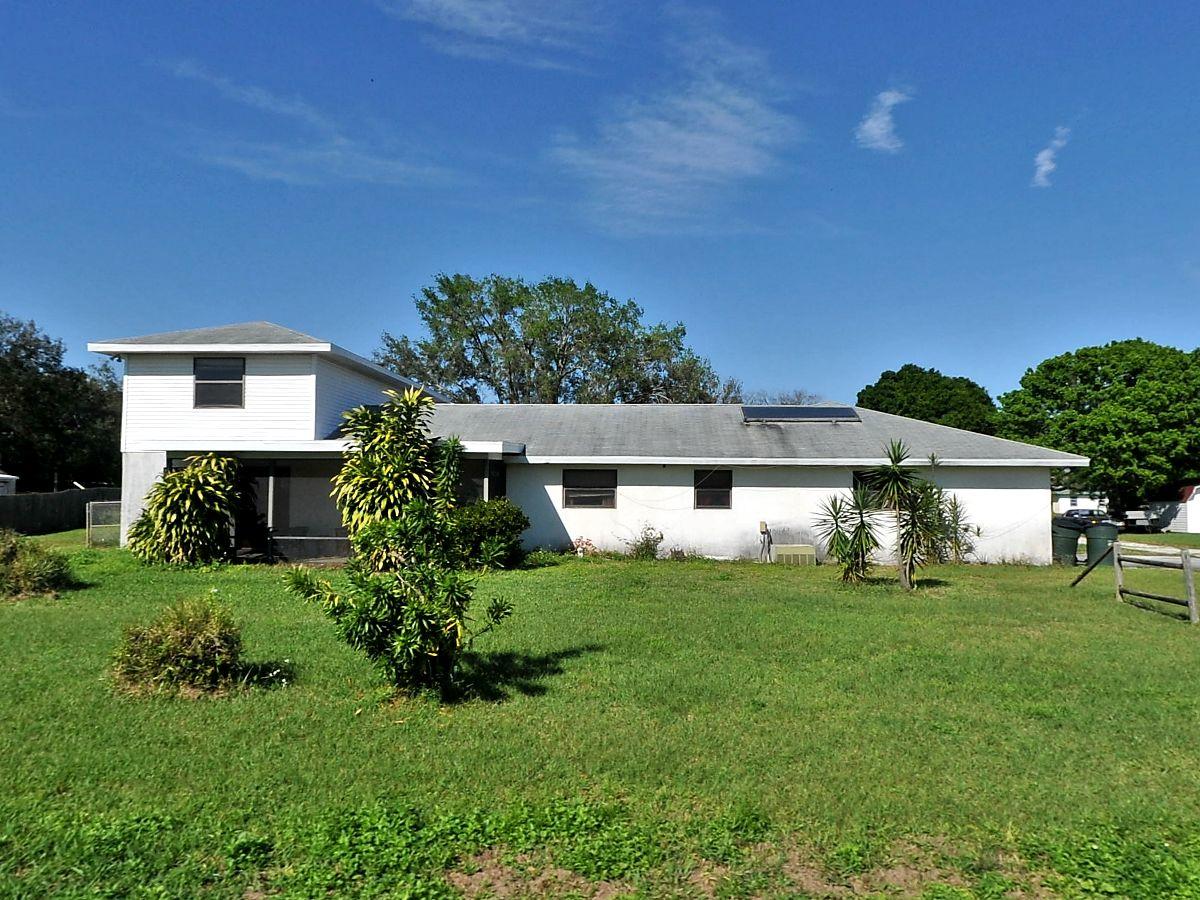 1004 Tumblin Kling Road Fort Pierce, FL 34982 - Photo 1 of 26 front