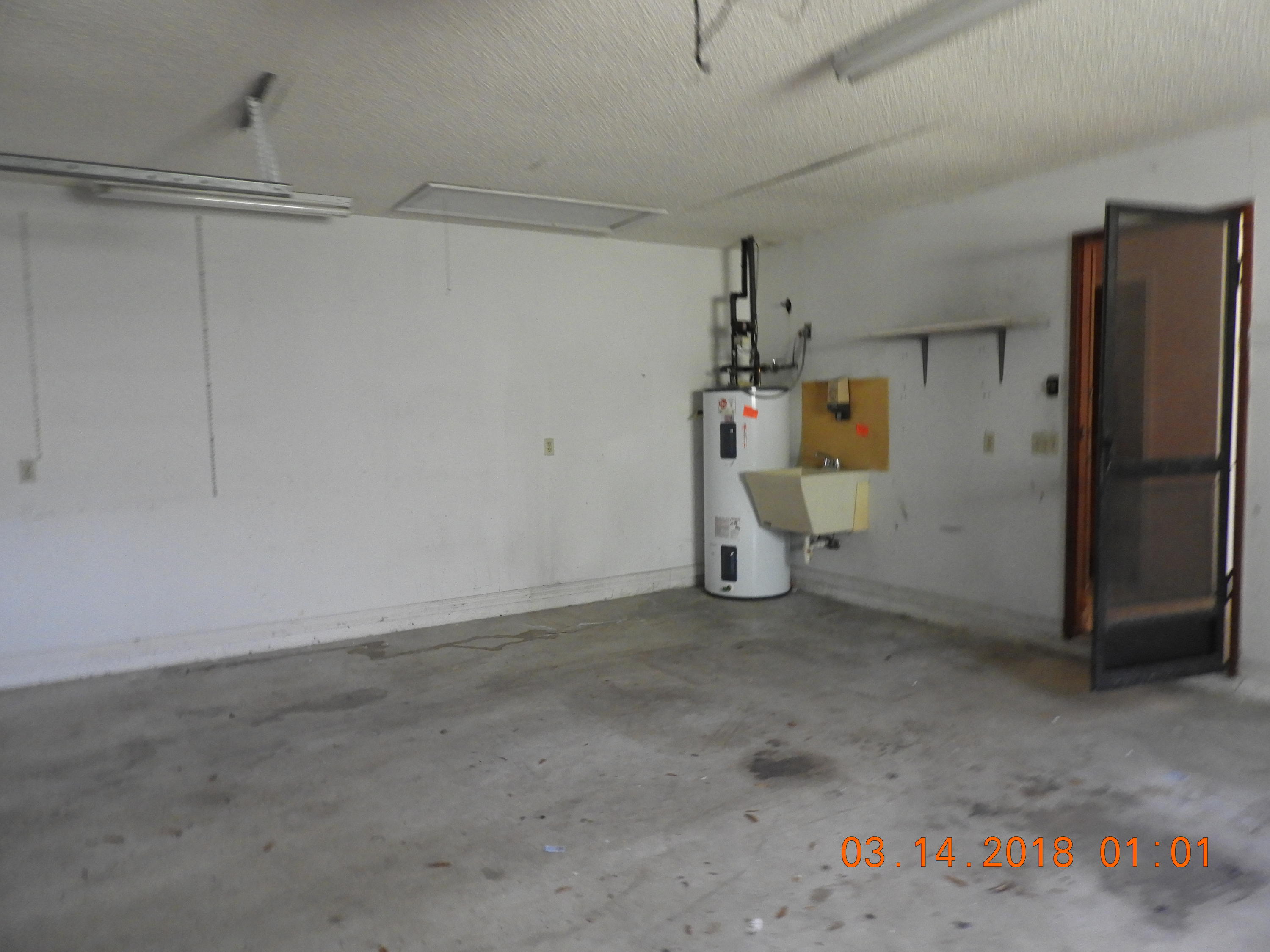 1004 Tumblin Kling Road Fort Pierce, FL 34982 - Photo 23 of 26 garage