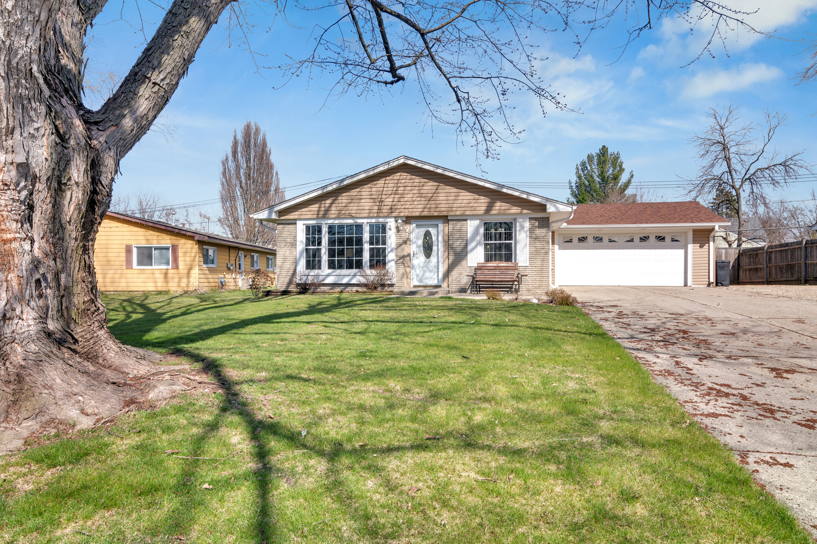 72 Marnel Road Montgomery, IL 60538 - Photo 1 of 26 a front view of a house with garden