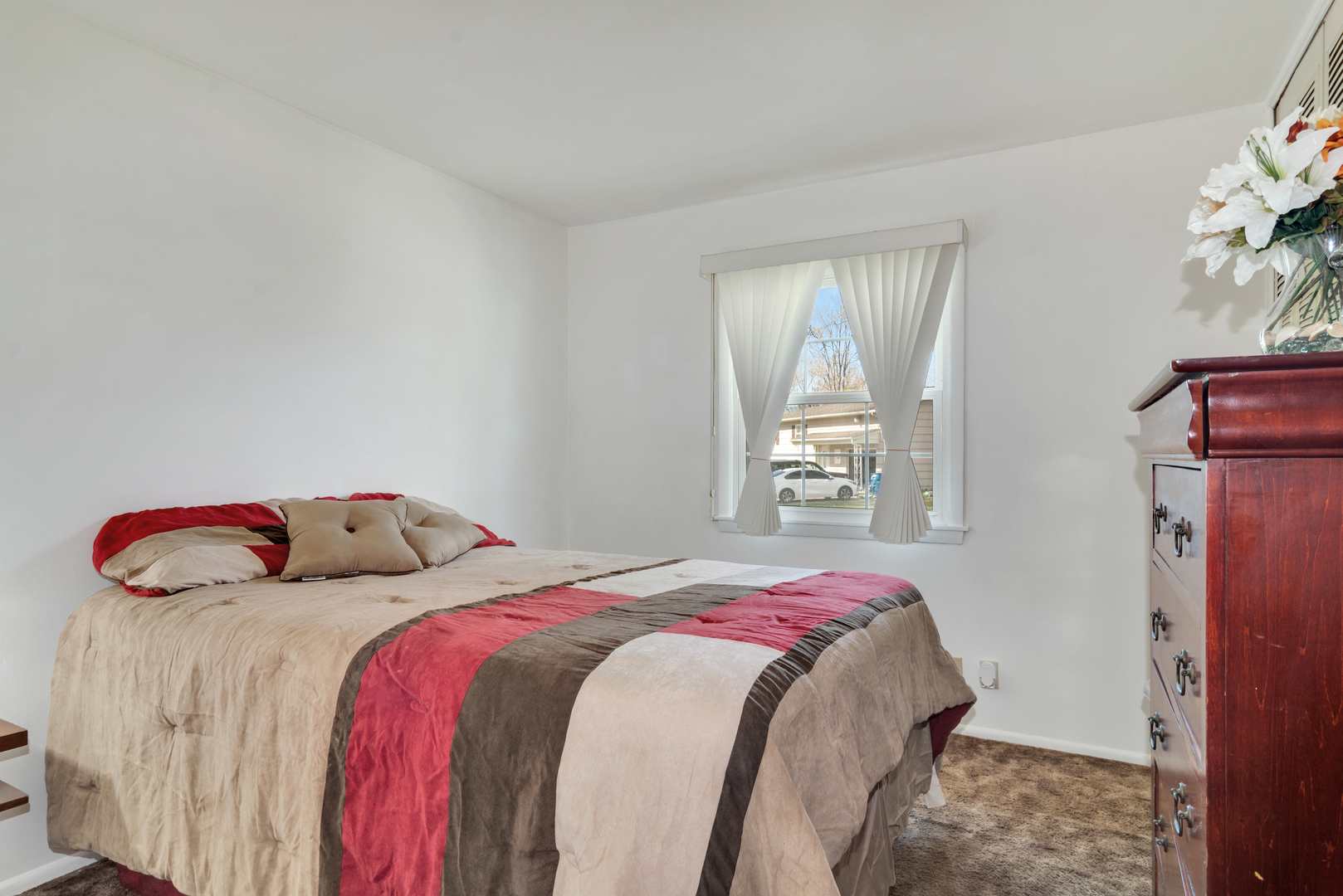 72 Marnel Road Montgomery, IL 60538 - Photo 21 of 26 a bedroom with a bed and a window