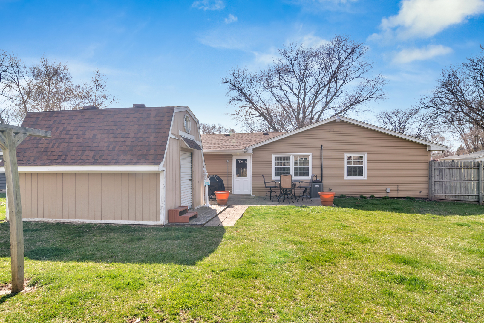72 Marnel Road Montgomery, IL 60538 - Photo 23 of 26 a view of a backyard with a garden