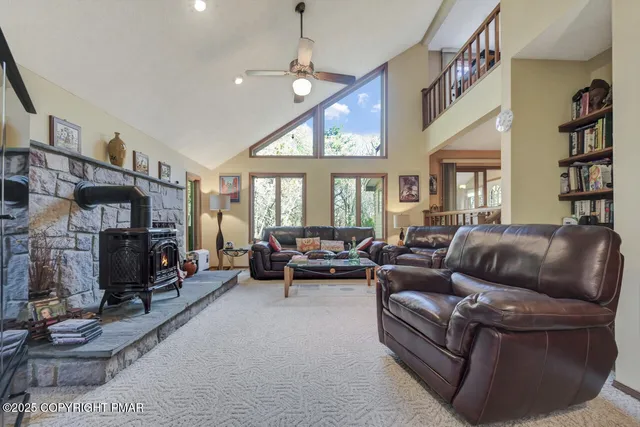 a kitchen with sink refrigerator and cabinets