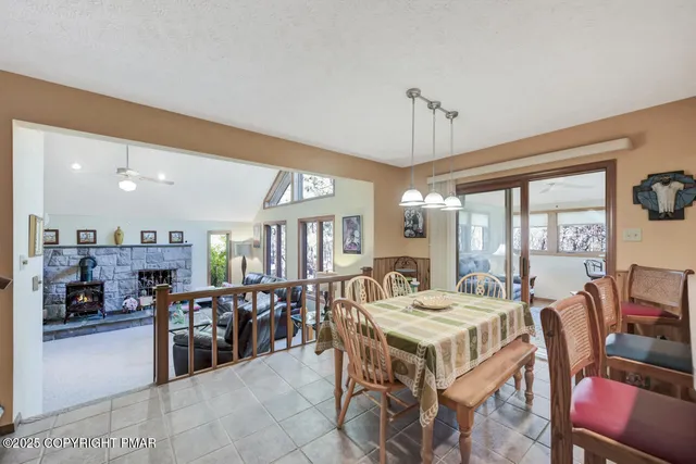 a kitchen with stainless steel appliances kitchen island granite countertop a sink and cabinets