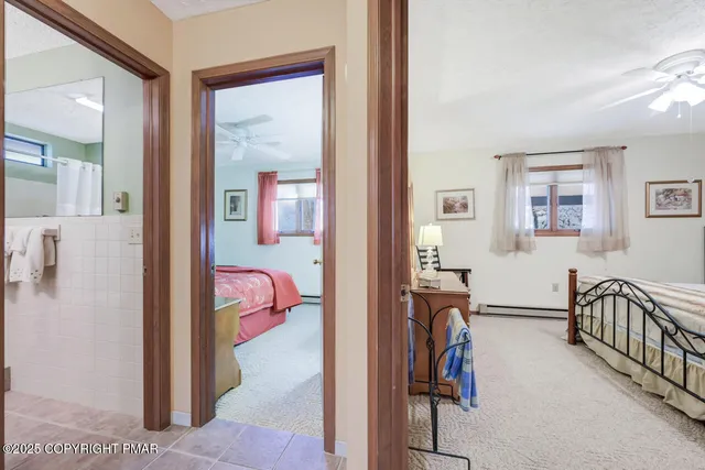 a bed room with a bed and a dresser