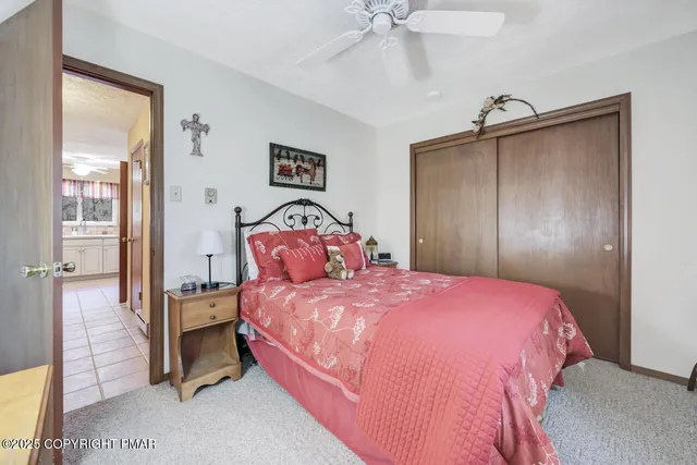 a view of a house with wooden deck