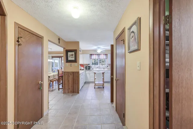 a view of a chair and table in the balcony