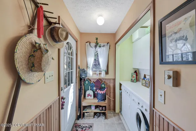 a view of a chair and table in the balcony