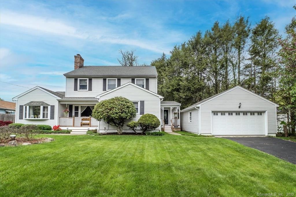 1 Country Ridge Road Danbury, CT 06811 - Photo 1 of 1 a front view of a house with garden