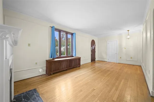 a view of a room with a large window