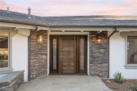 a front view of a house with shower