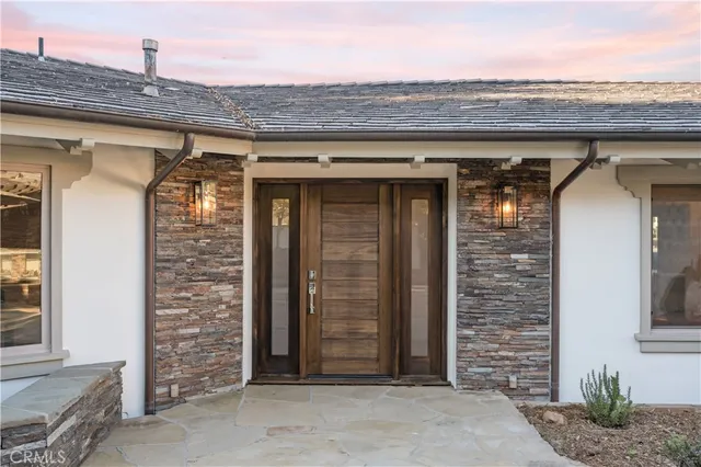 a front view of a house with shower