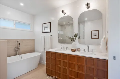 a bathroom with a toilet a sink and bathtub