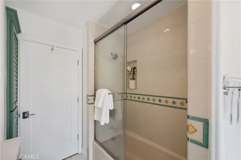 a view of a terrace with chairs and potted plants