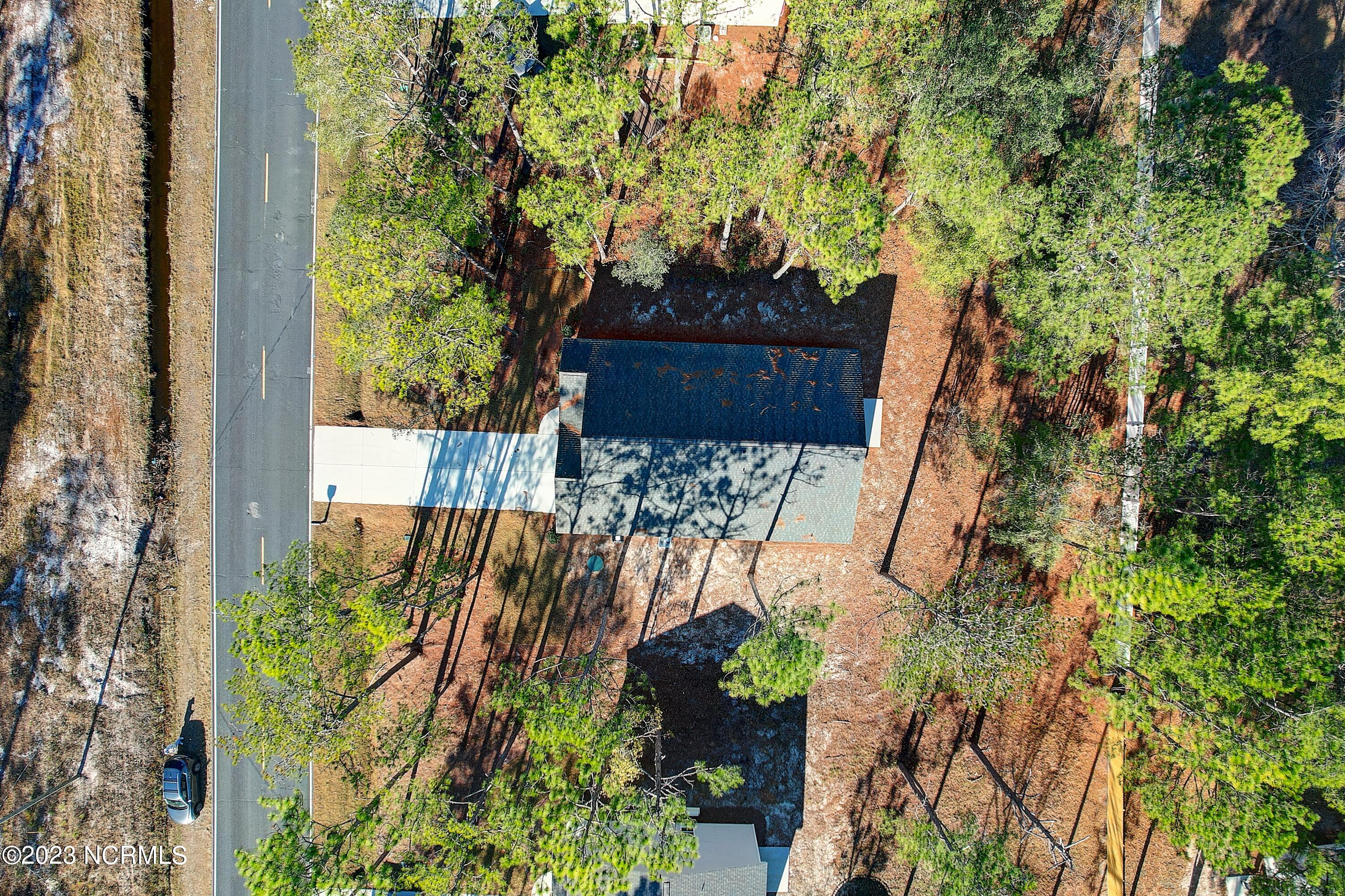 860 Village Point Road Southwest Shallotte, NC 28470 - Photo 24 of 28 Arial of Home and Lot