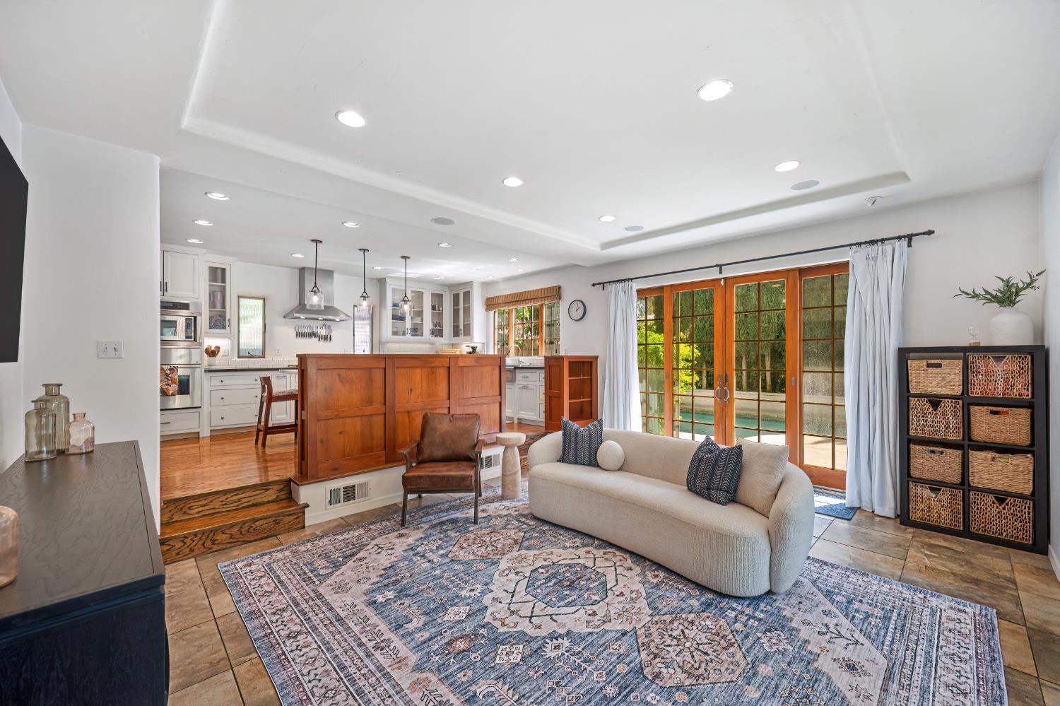 3501 Cutter Way Sacramento, CA 95818 - Photo 23 of 89 a living room with furniture and a rug