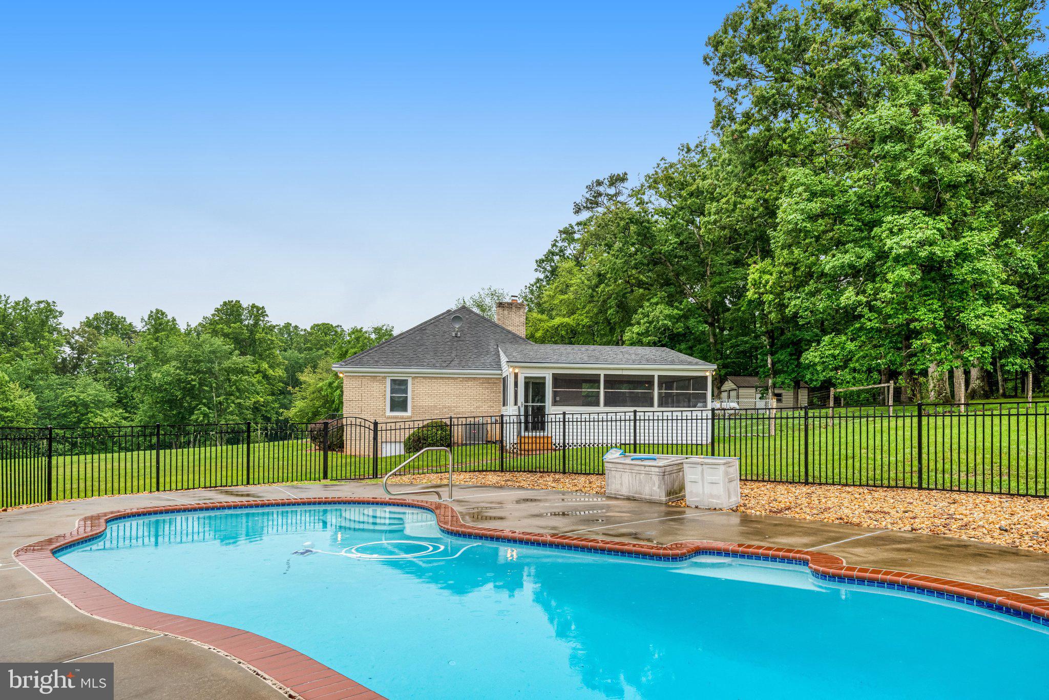 7961 Leeds Manor Road Marshall, VA 20115 - Photo 33 of 40 a view of a house with a backyard