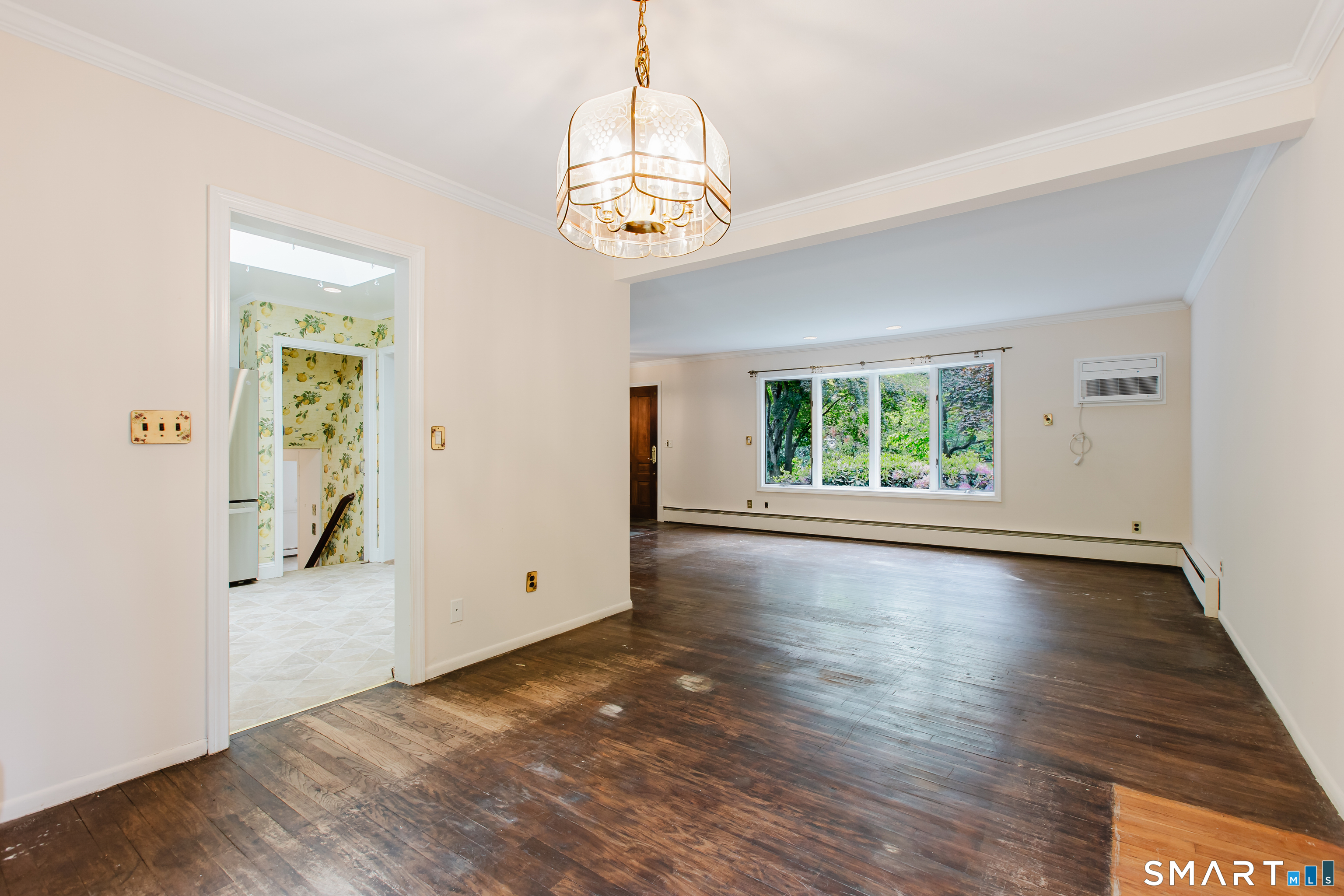 75 Westwood Road Stamford, CT 06902 - Photo 9 of 40 Dining Room & Living Room are original hardwood floors
