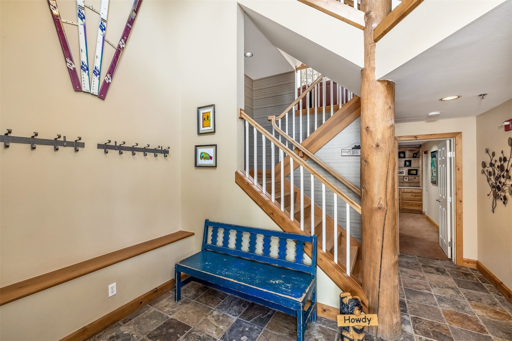 71 Starfire Lane, Unit 1978 Keystone, CO 80435 - Photo 28 of 40 a view of entryway with wooden floor and stairs