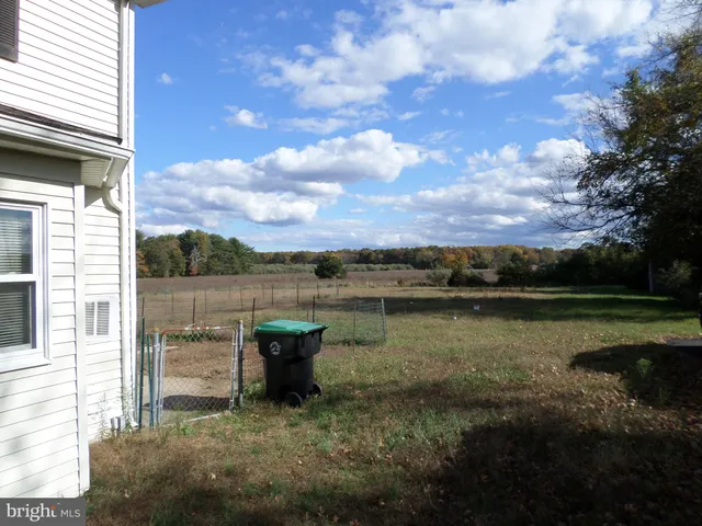 a view of a lake from a yard