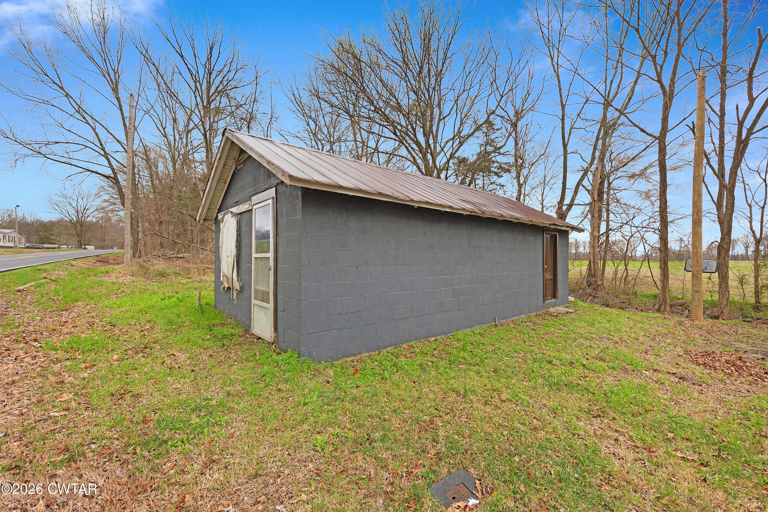 461 Humboldt Gibson Wells Road Humboldt, TN 38343 - Photo 19 of 24 a view of backyard of house