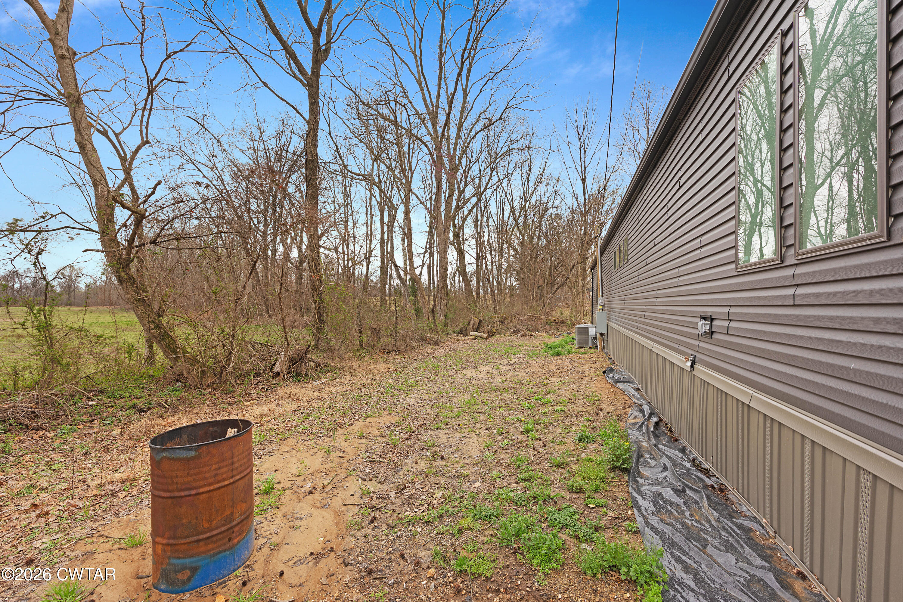 461 Humboldt Gibson Wells Road Humboldt, TN 38343 - Photo 23 of 24 a backyard of a house