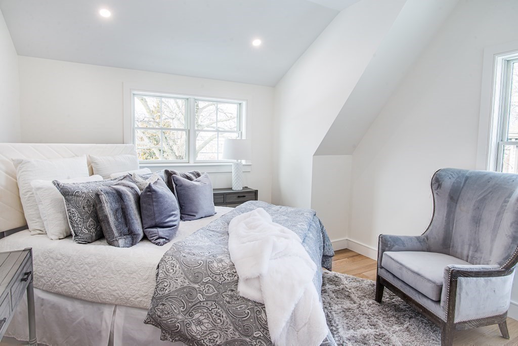 62 Sachem Road Needham, MA 02494 - Photo 17 of 25 a bedroom with two beds and a couch
