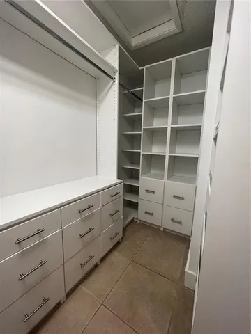 a view of an empty walk in closet
